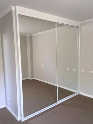 Bedroom Built-in Wardrobe with Large Glass Sliding Doors